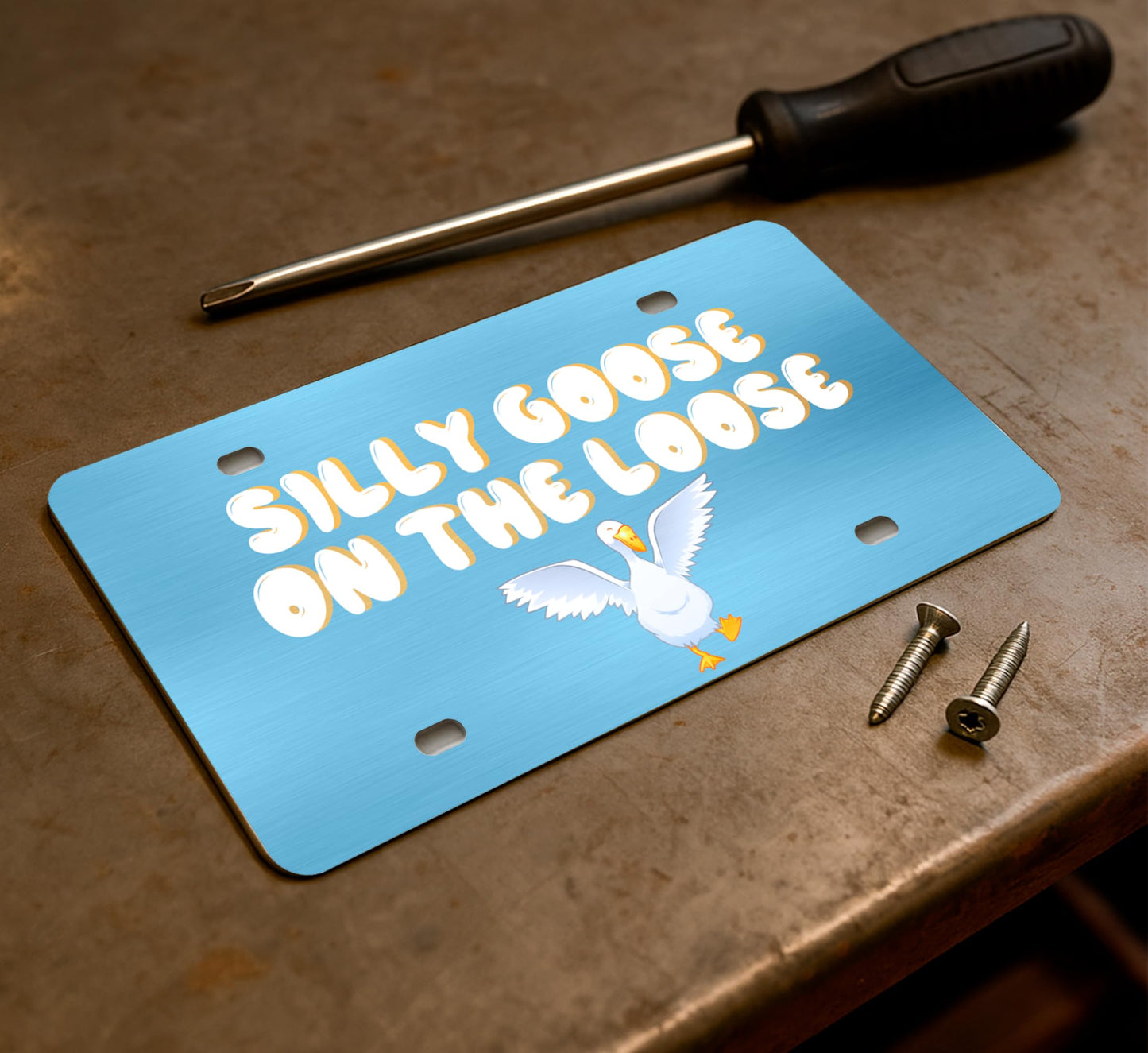 6x12.25 Inch Personalized Funny Silly Goose on The Loose License Plate Frame with 4 Holes and Screws - Decorative License Plate Frame Front